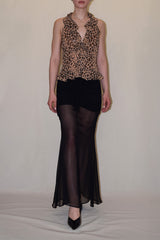 Full-length studio linesheet view showcasing the front silhouette of the leopard print Felicia halter neck top with its structured peplum flare and ruffled bodice.