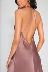 Back view of the Vanessa Slip Dress showcasing delicate spaghetti straps, dramatic low back, satin finish, and graceful flowing silhouette.